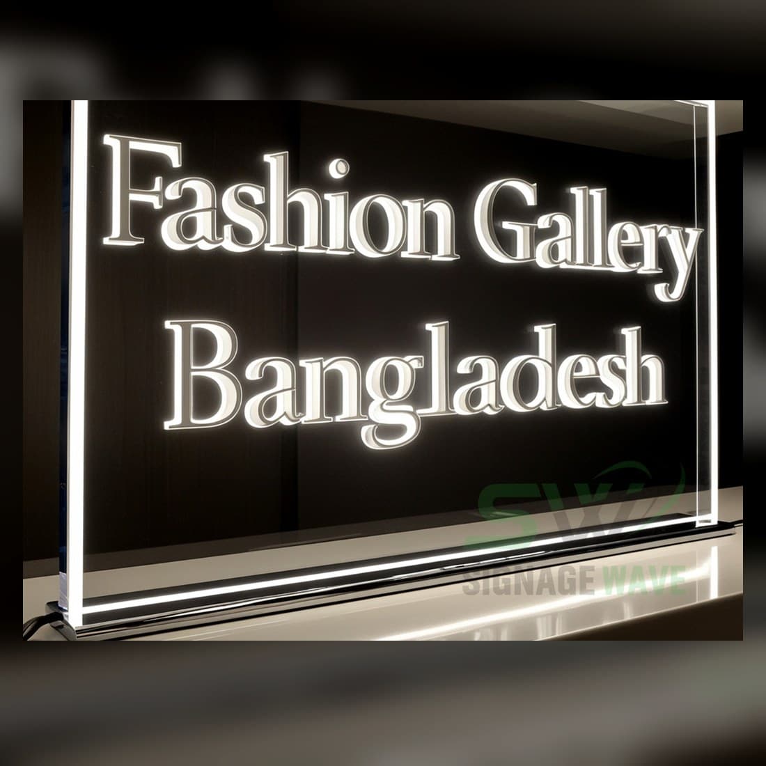 Real acrylic dual-lit Fashion Gallery Bangladesh sign glowing on a wall